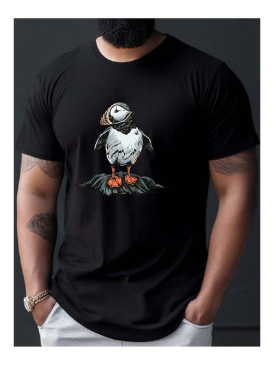 Black t-shirt featuring a colorful puffin bird design showcasing latest fashion trends.