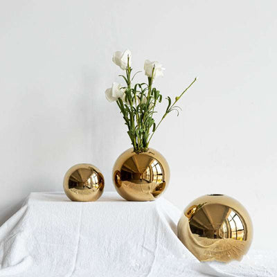 Electroplated ceramic gold spherical vases in small, medium, and large sizes for home decor