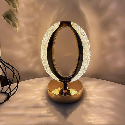 Modern minimalist Star Eye Light with crystal acrylic frame, touch-activated, gold and star light hue, home decor lamp.