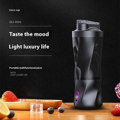 Black portable electric juicer blending cup with stainless steel liner and plastic body for multifunctional juicing