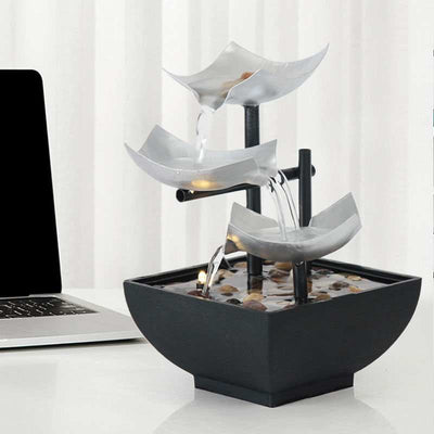 Home decoration flowing water desktop fountain with alloy and plastic design.